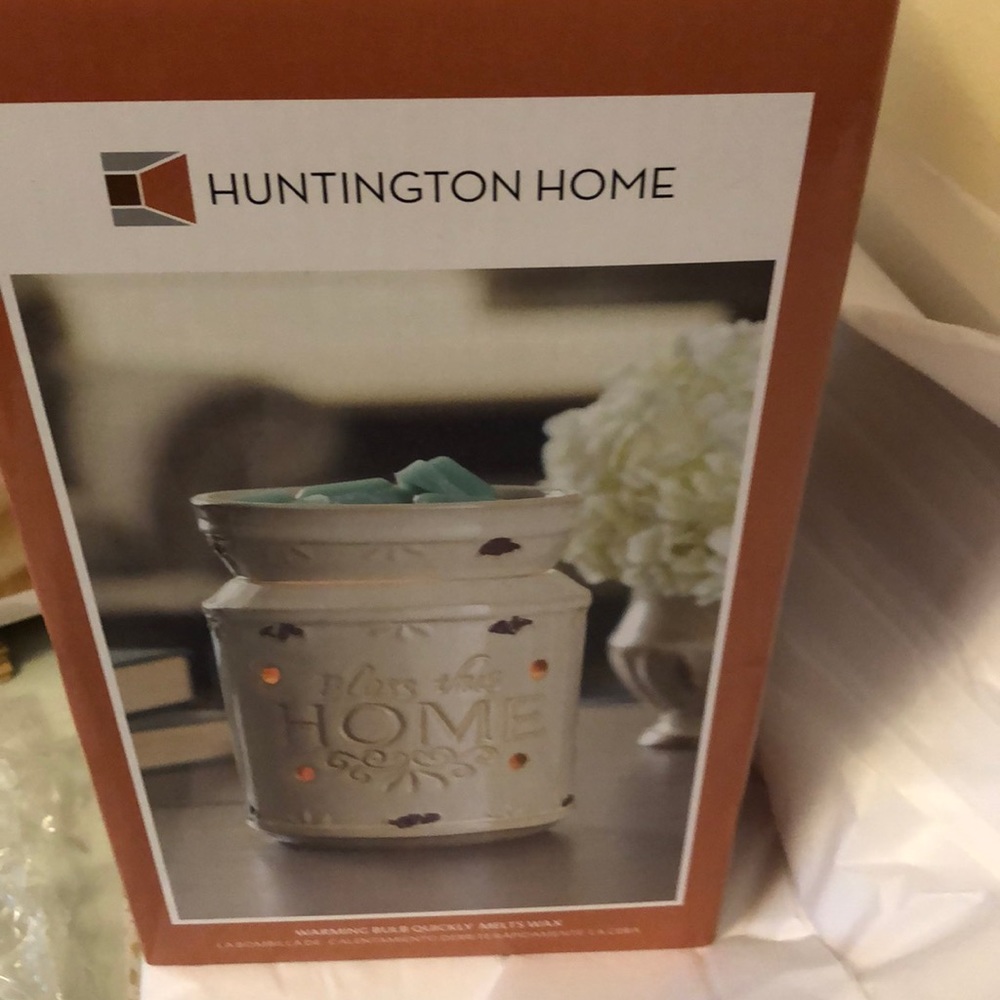 Ceramic holder for scented wax melting.